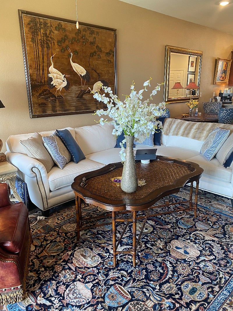 The white sofa is Sunbrella Outdoor Fabric and easy to clean!! Take your shoes off, put your feet up, and relax!!!