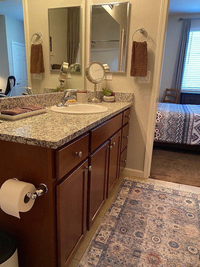 Your Own Private Bathroom with granite counters, medicine cabinet, lighted and magnified 10X makeup mirror! Bathtub goodies in cabinet! Hand held shower head!