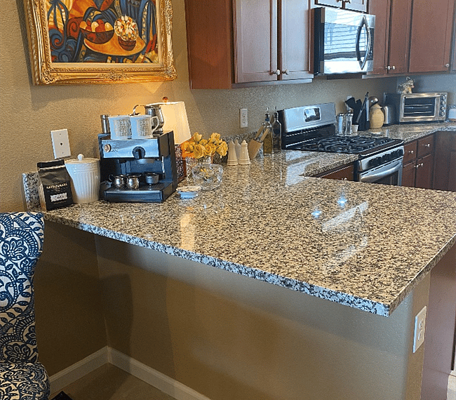 Kitchen with granite counters, and espresso machine, and 5 burner gas range, and convection microwave oven, and counter top convection oven, toaster, and lots of cookware!!