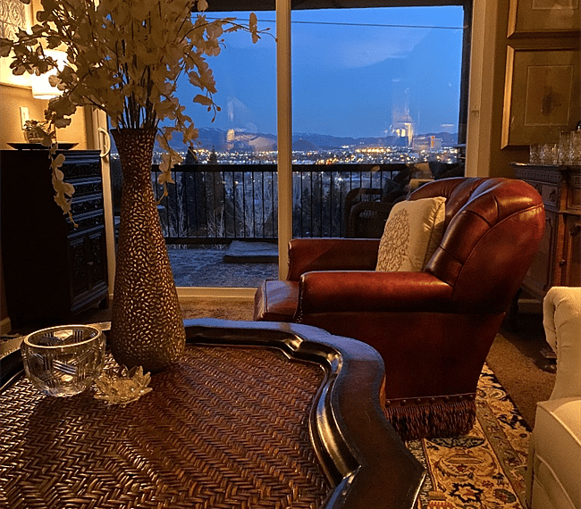 Living Room with Southern view! Everyone loves the swivel leather chair!! Take in the view and watch the sun rise or set!