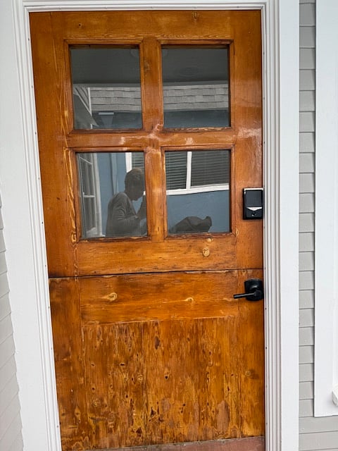 Front door with a combination digital lock
