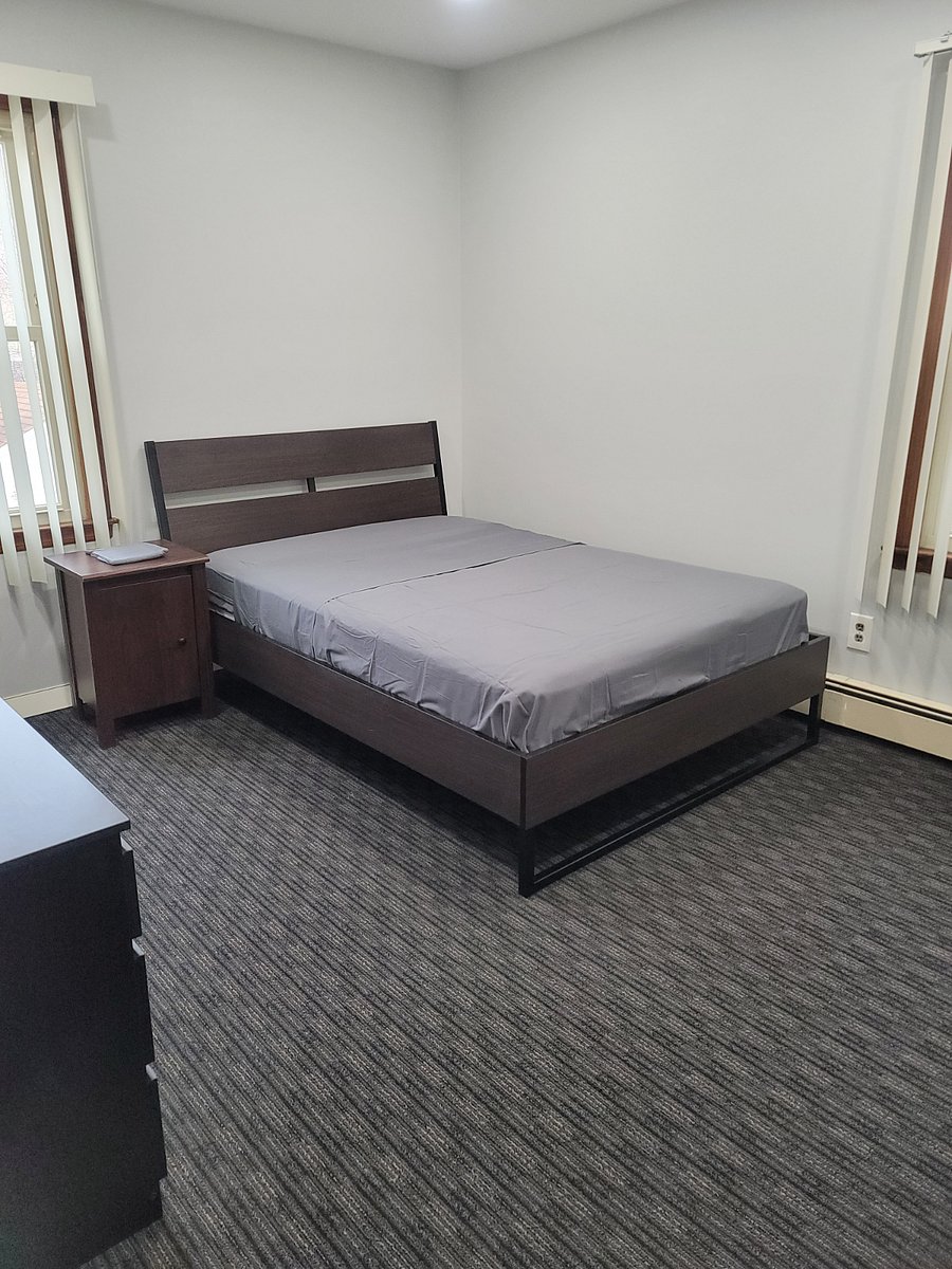 Second Bedroom with desk and 55 inch smart TV