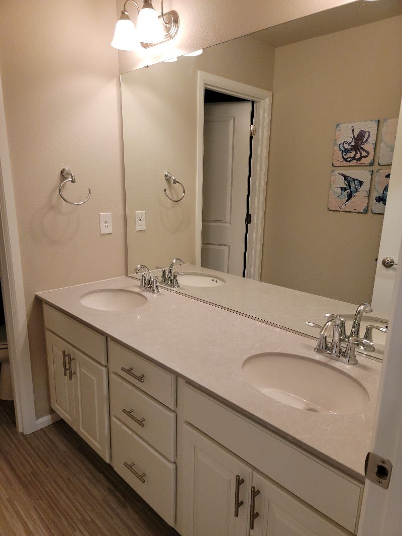 Sunrise suite shares this large double vanity bathroom with up to one other female professional.