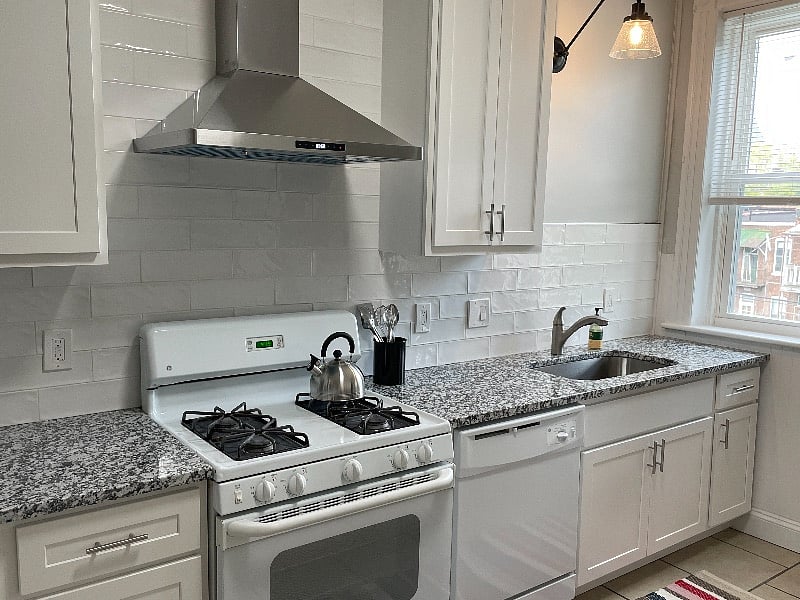 New kitchen cabinets, granite countertops, new refrigerator. Kitchen has a dishwasher too.