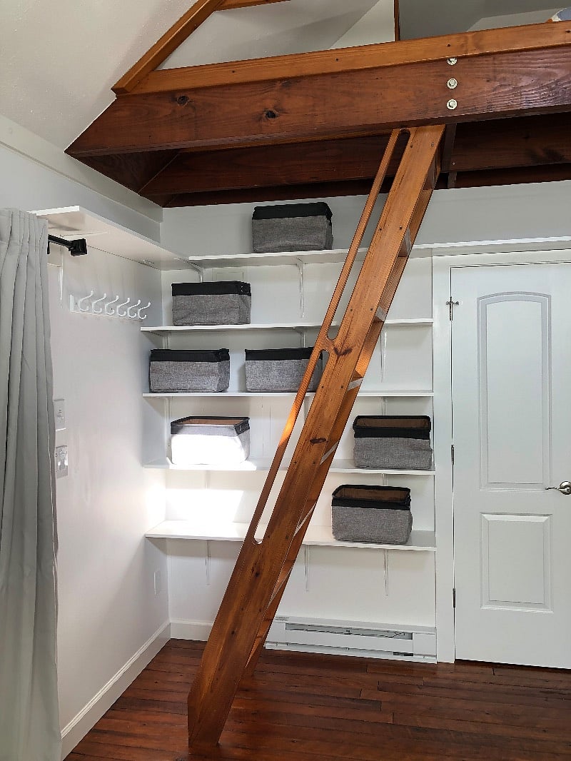 Ladder stair to sleeping loft.