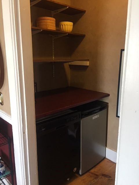 Butlers pantry with dishwasher, mini fridge and microwave. Lots of shelf space.