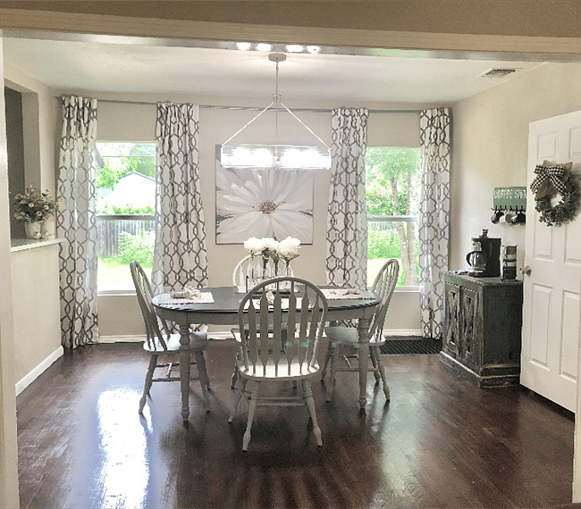 Adorable dining area with bar and barstools. Coffee bar.