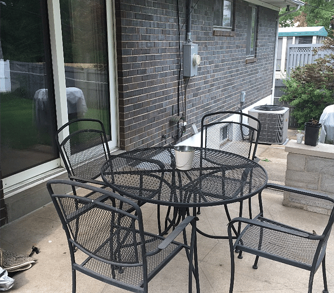 patio table and charcoal grill