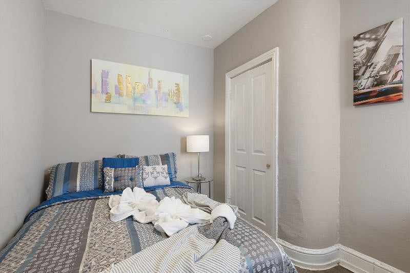 Bdrm 3 has a full size bed, closet space, AC, and desk area