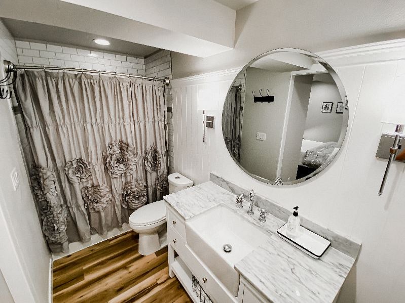 Spacious bathroom includes tub/shower and laundry facilities