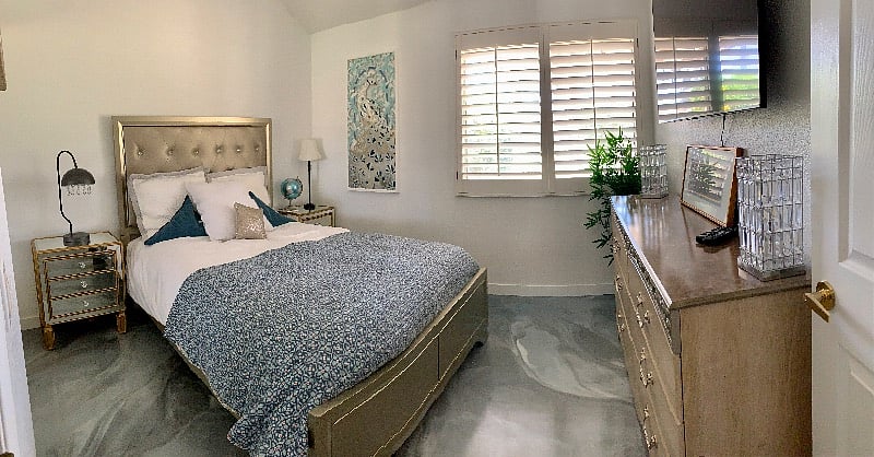 Guest bedroom with Queen bed and 65in smart TV