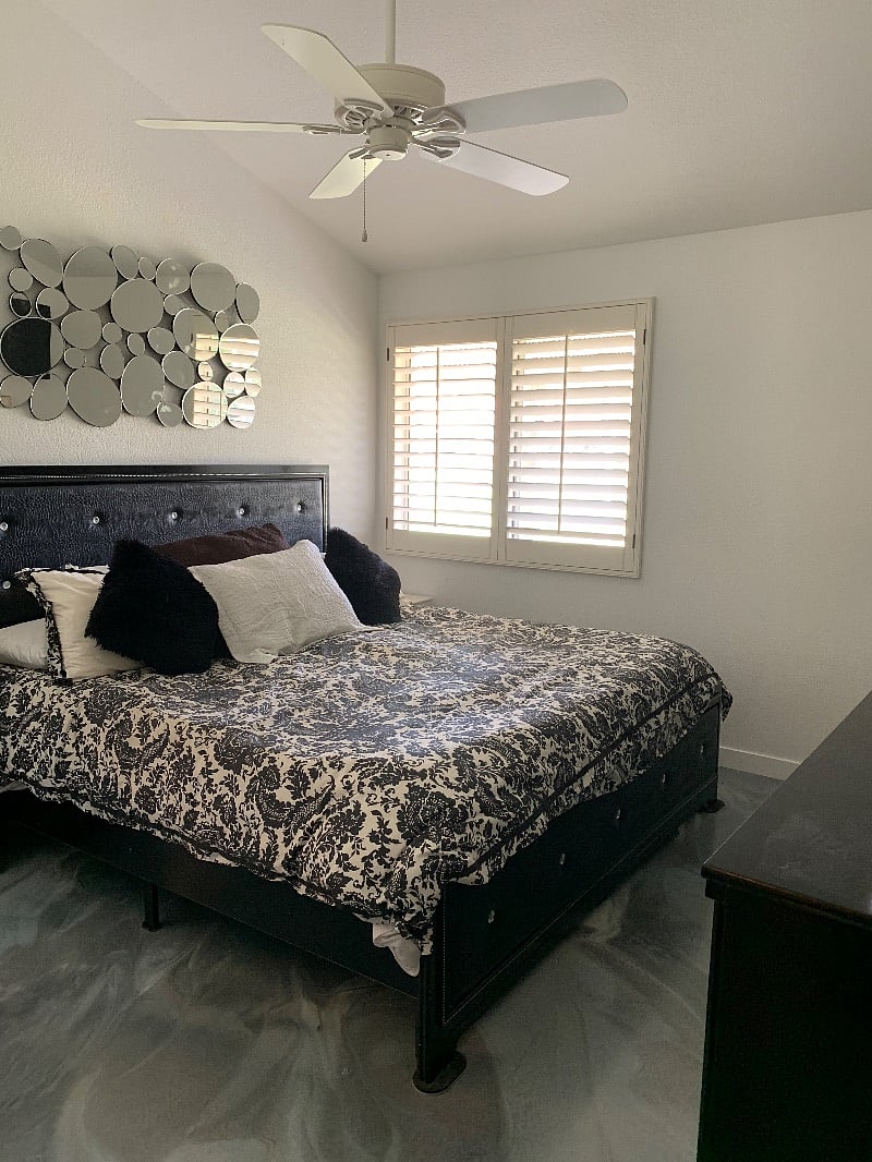 Master Bedroom with King sized bed and 65in smart TV