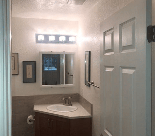 2nd bathroom with quartz counter top vanity