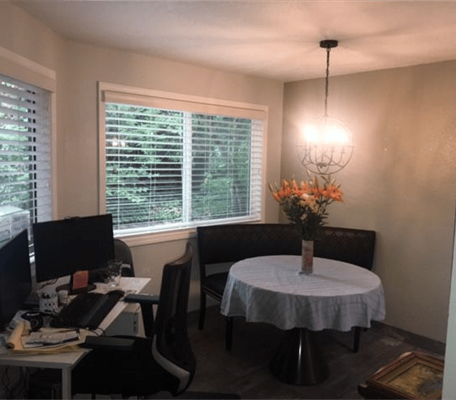 dining room with curved leather booth