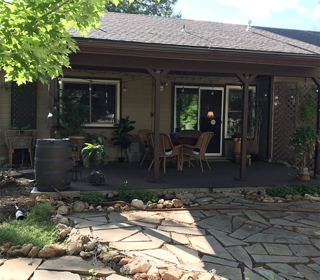 covered back patio & "garden" area with water feature