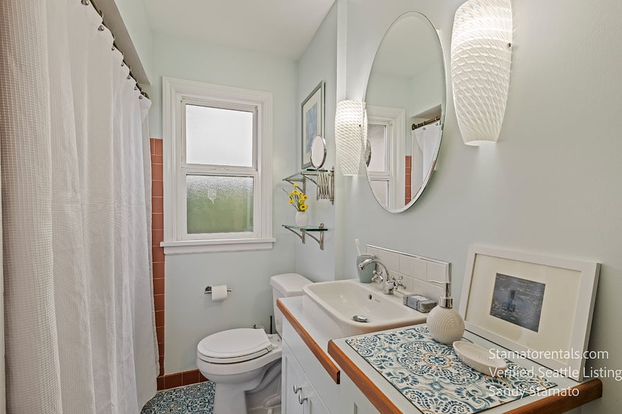 This 1946 bathroom has all the charm of a different era with all the modern amenities. Not visible is a floor to ceiling closet for any and all toiletries, personal care products, etc