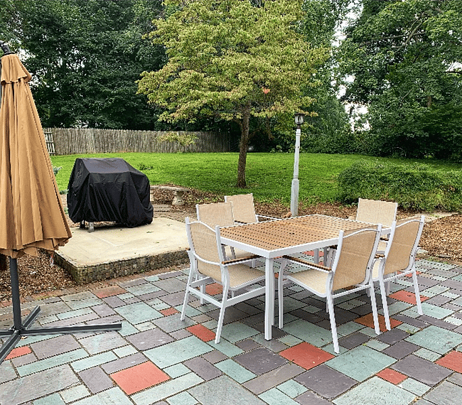 .5 acre backyard with grill and patio set