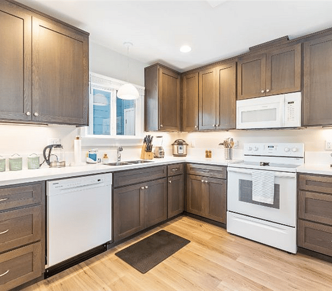 Main floor full Kitchen - fully equipped for all your needs! Close access from unit 1 and 2!