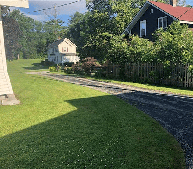 Long driveway can park 4 vehicles easily + single car garage at end of driveway