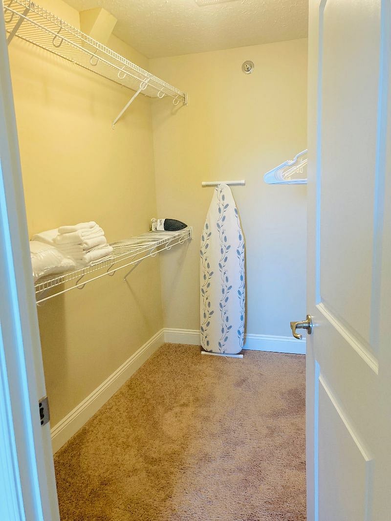 Master bed walk in closet