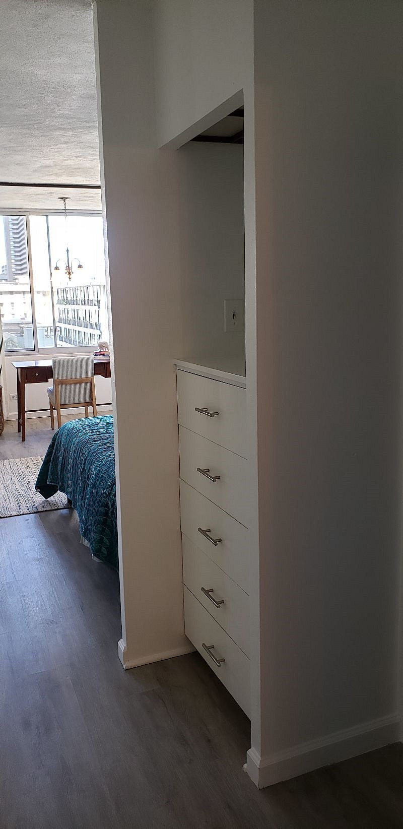 Built-in dresser for additional storage.
