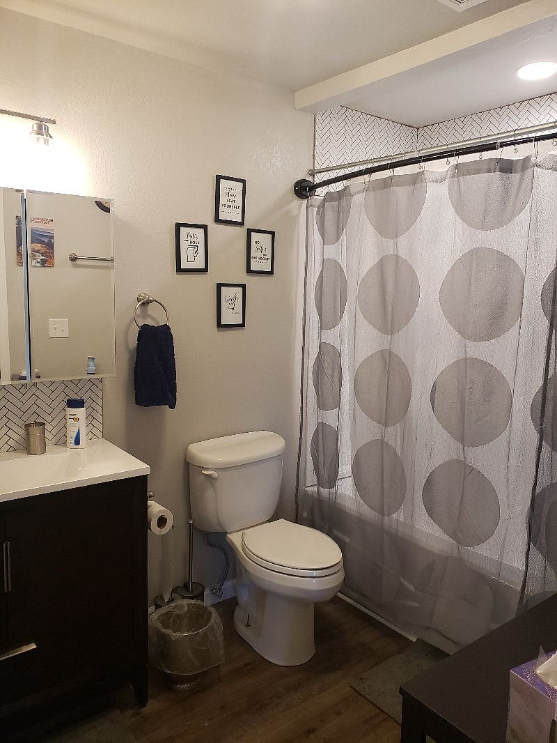 Updated bathroom with backsplash in shower and tile with a tub/shower combo. Lots of storage and all linens provided.