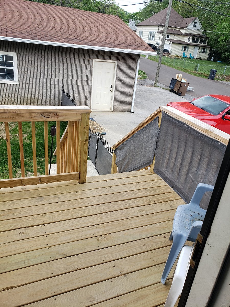 Exterior/side private entrance. This exits into the private yard. Private deck, lower patio and fenced yard.