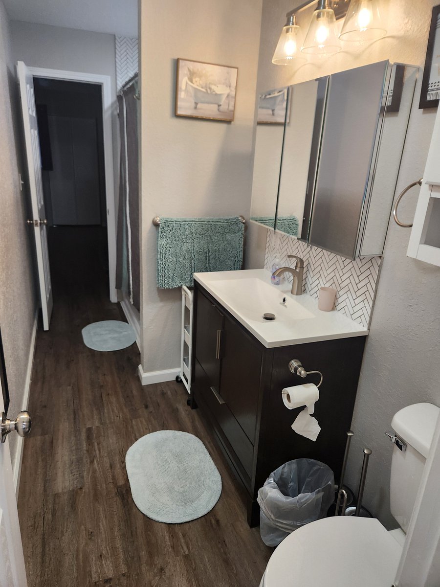 Bathroom attached to king bedroom and opens to livingroom. Full tub/shower. Lots of storage and all linens provided.