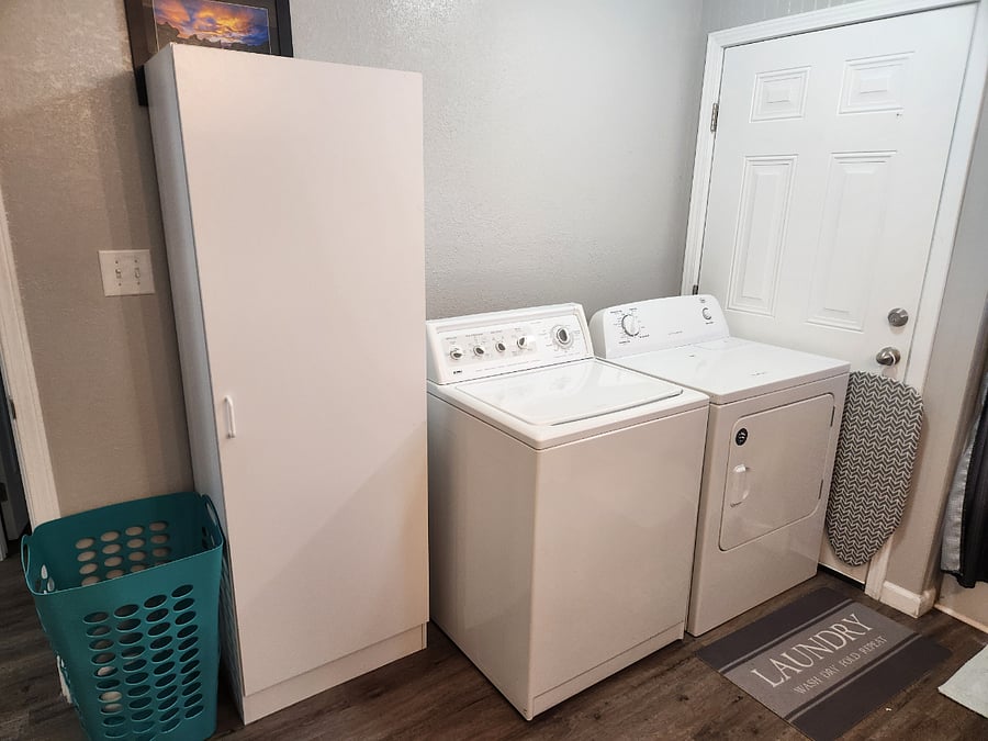 Laundry - full size w/d with lots of storage.