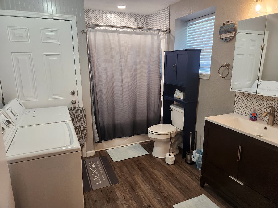 Bath 2 - full tub/shower and w/d in bathroom. Lots of storage and all linens provided.