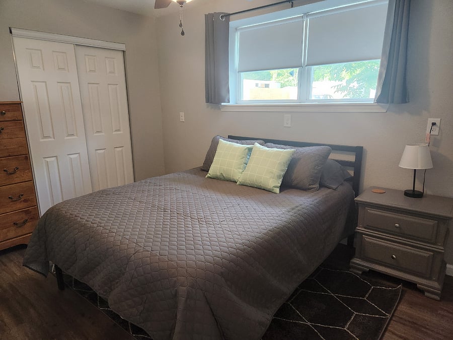 Guest bedroom 2 - queen bed with dresser and large closet.