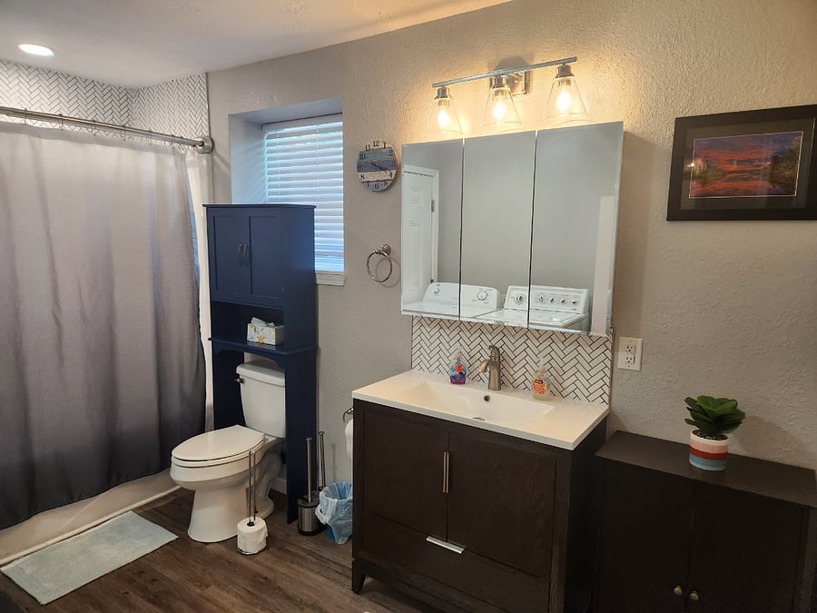 Bath 2 - tub/shower with lots of storage and all linens provided.