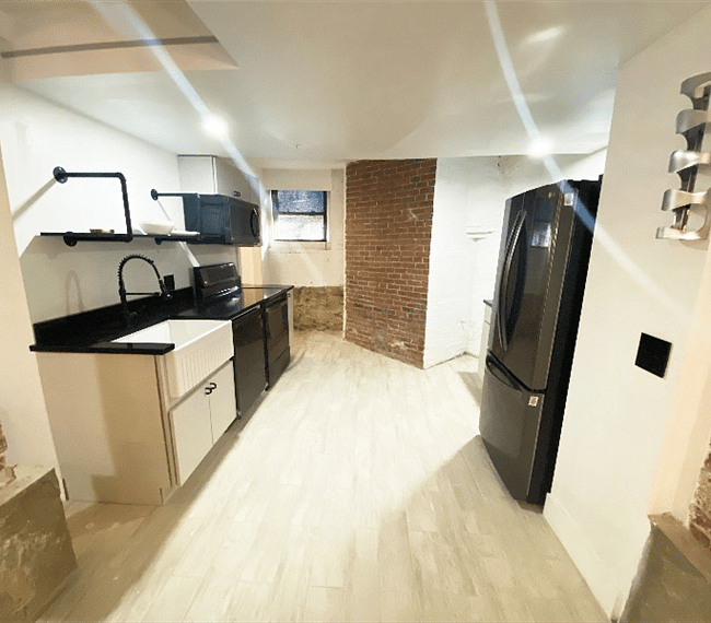 Kitchen: microwave, dishwasher, electric range, farmer's sink, refrigerator