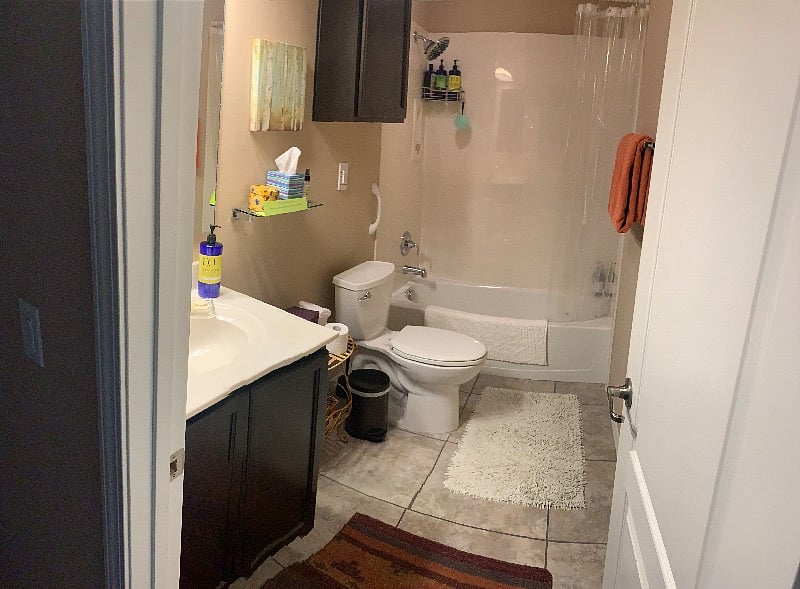 Full size bathroom with tub/rain shower