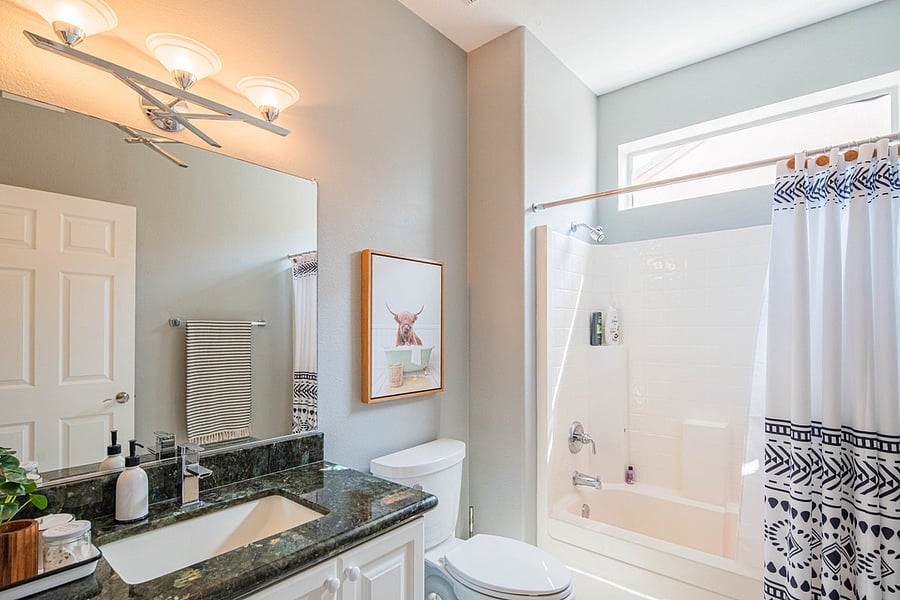 Guest bathroom with tub. 