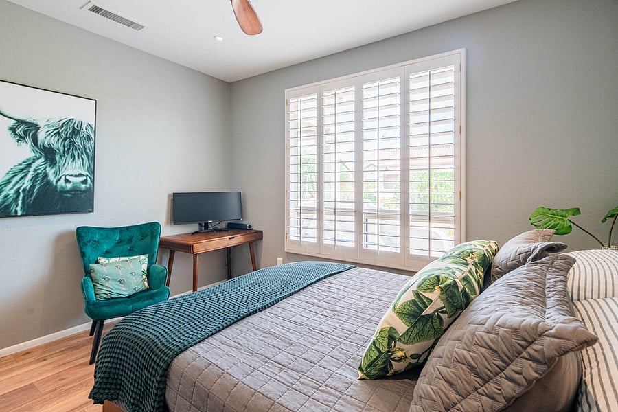 Second guest bedroom with a monitor/TV for working from home. 