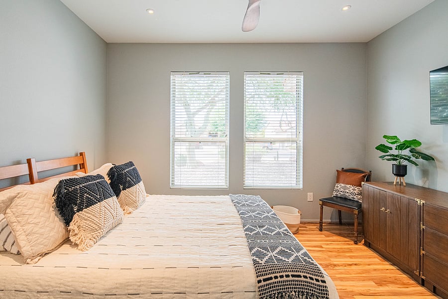 Guest Bedroom with a large closet and TV