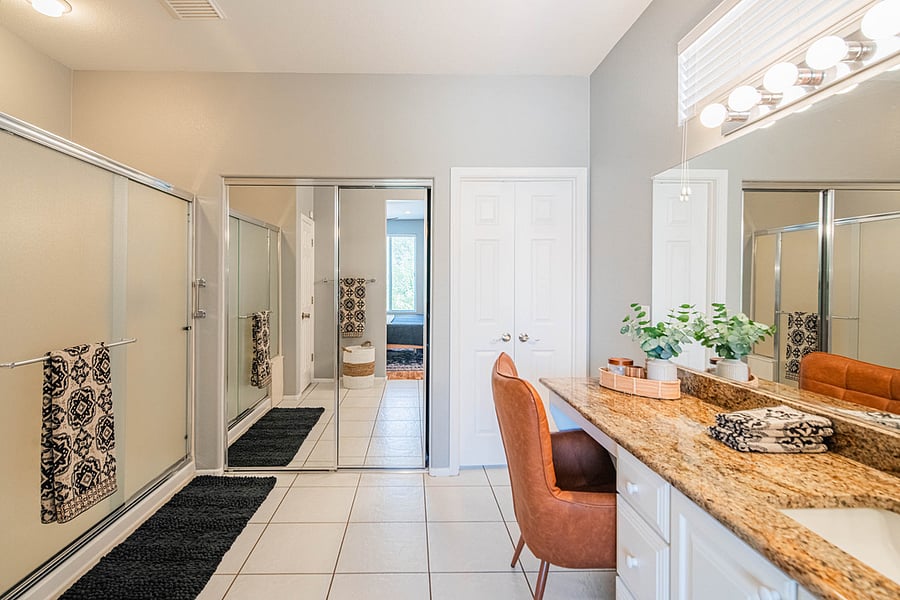 Ensuite bathroom with a walk-in closet. 