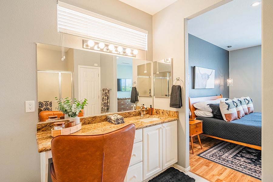 Ensuite bathroom with a walk-in closet. 