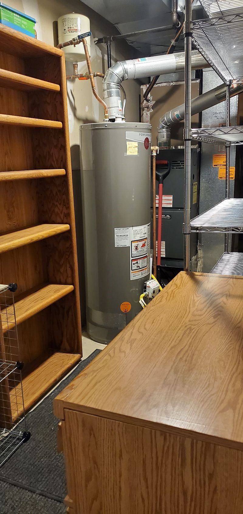 Full sized refrigerator. No ice maker. Plenty of storage. Area for a bicycle also.