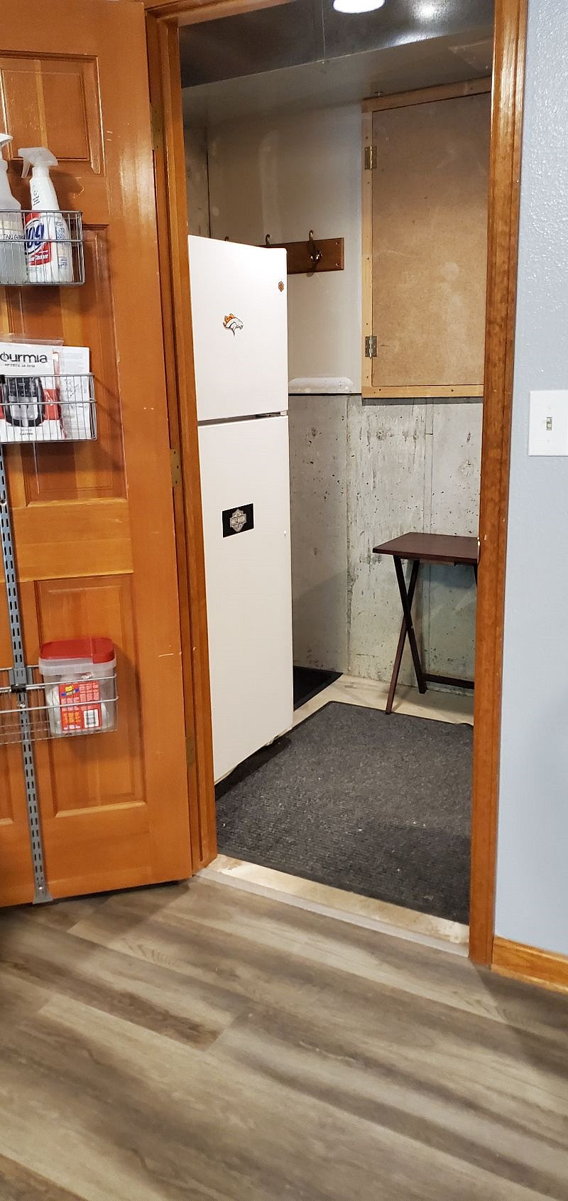 Full sized refrigerator. No ice maker. Plenty of storage. Area for a bicycle also.