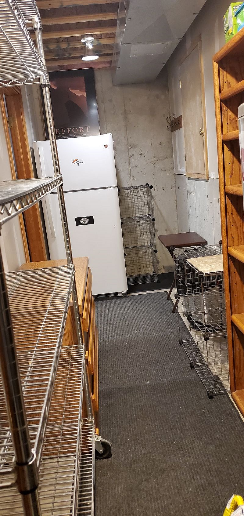 Full sized refrigerator. No ice maker. Plenty of storage. Area for a bicycle also.