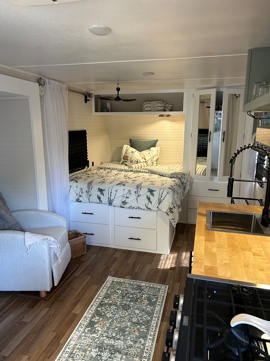 4 large drawers at foot of bed, side of the bed has a built in doggie den, side closet with 3 large drawers.