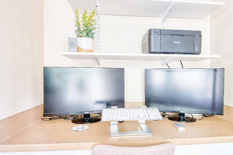 Two monitors you can hook up to your laptop available. Printer also available.