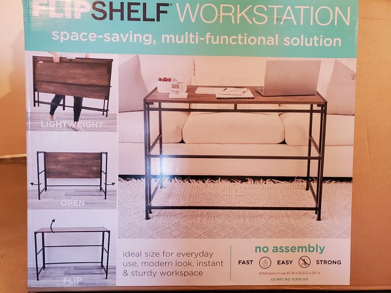 Also in the storage area is a portable work desk that can be stored when not needed or in use.