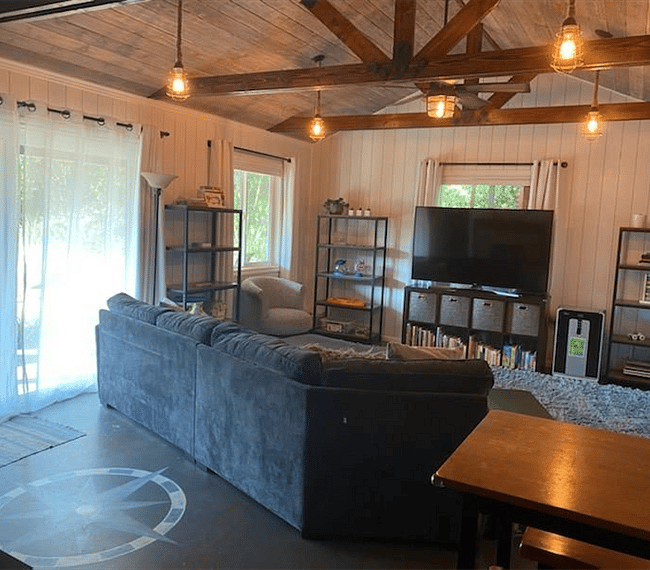 Living room area (older photo, but left it since it shows the ceiling fan.