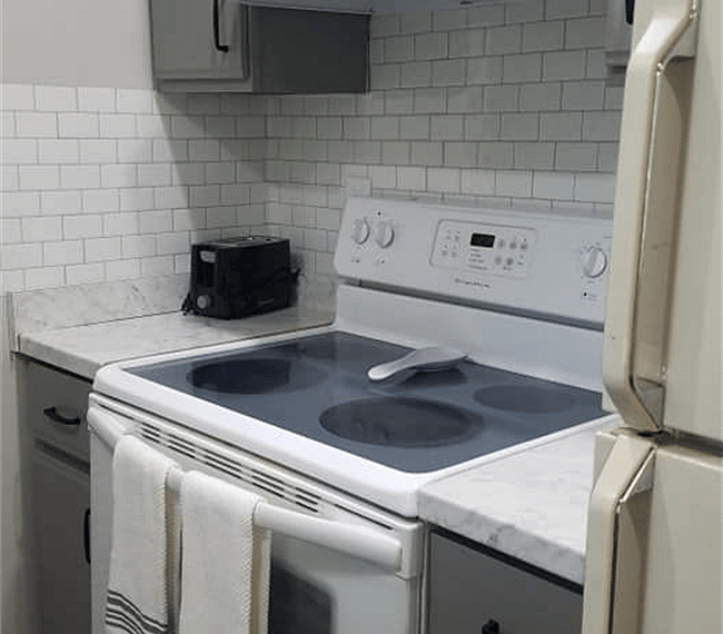 #1. Uptown Condo. Kitchen.