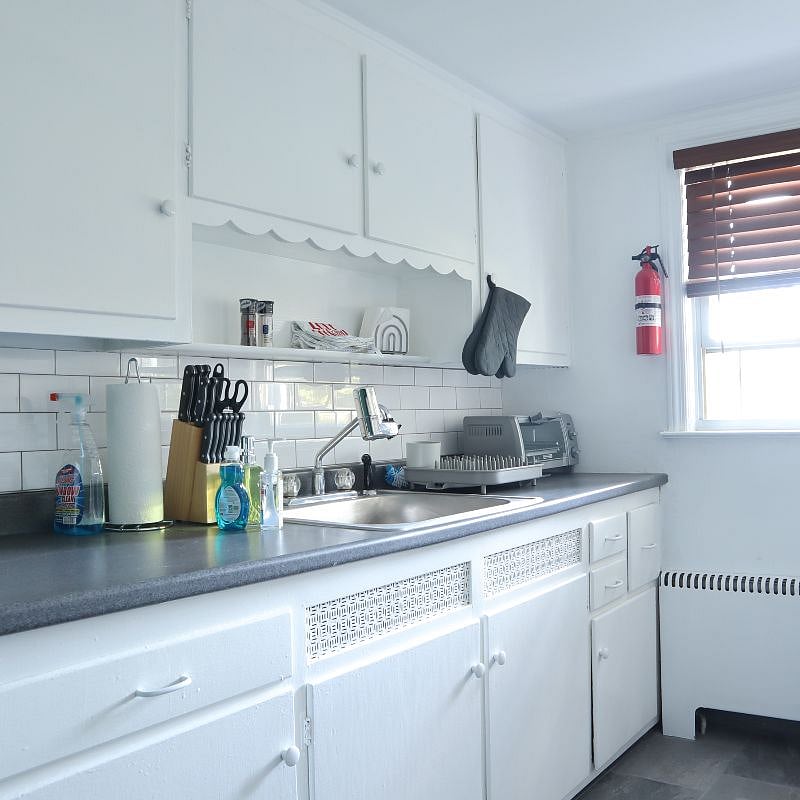 Fully stocked kitchen with cooking and baking supplies. Spices, oilve oil, keurig coffee machine, microwave, full size appliances, and both toaster and toaster oven.