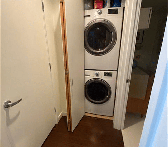 Laundry is equipped with full-size washer and electric dryer.