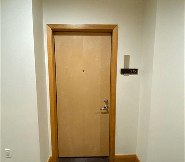 The unit entry is off the shared corridor...not too far from the elevators.